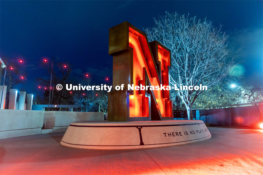 The N Sculpture and steps in front of Wick Alumni Center are lit with red lights for the Glow Big Red event. February 14, 2024. Photo by Kristen Labadie / University Communication.
